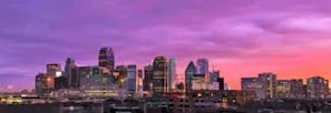 Experience the vibrant city skyline from a unique perspective.