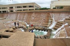 Experience the tranquil atmosphere of this multi-tiered water feature, designed for relaxation and recreation.