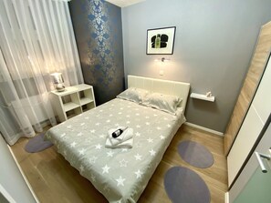 2 dormitorios, tabla de planchar con plancha, wifi y ropa de cama