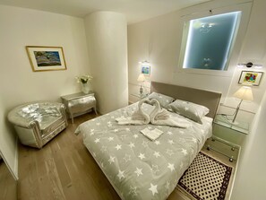 2 dormitorios, tabla de planchar con plancha, wifi y ropa de cama