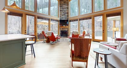 Fully rebuilt riverfront home with deck, fireplace, & W/D - dog-friendly