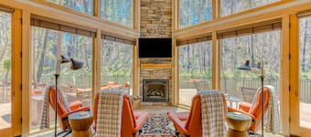 Unique riverfront home + cabin with amazing views, deck, & W/D - dog-friendly