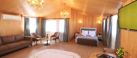 Honeymoon Room | Living area | 32-inch LCD TV with satellite channels