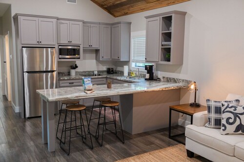 A Cozy Getaway Right on the Water, Two Creeks Crossing Resort