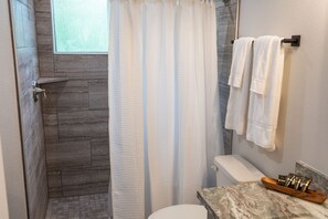 Shower, towels - Cozy, Spacious, and Right on the Banks of Rocky Creek, Two Creeks Crossing Resort (Livingston)
