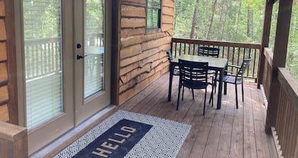 Relax with a view from above in a tree-top getaway! Two Creeks Crossing Resort