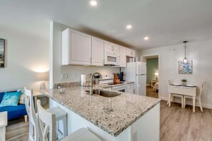 Fridge, microwave, oven, stovetop - 110 Bahia #1 - Canal Front Pet-Friendly Beach Unit (Fort Myers Beach)