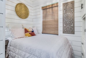 1 bedroom, desk, iron/ironing board, travel crib
