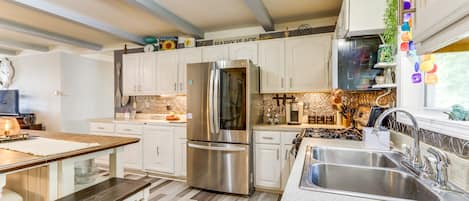 Fridge, microwave, oven, cookware/dishes/utensils