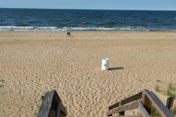 On the beach, sun loungers, beach towels