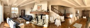 TV, caminetto, tavolo da calcetto, libri