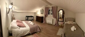 4 slaapkamers, een strijkplank/strijkijzer, reisbedje, gratis wifi