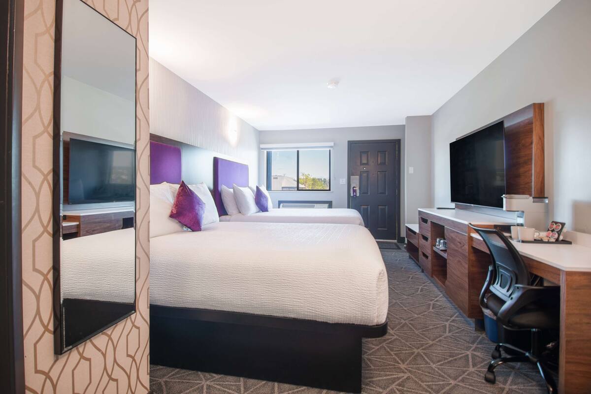 room, 2 queen beds | 1 bedroom, desk, laptop workspace, blackout curtains