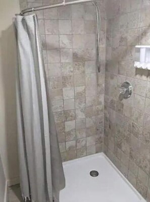 Regadera y shampoo