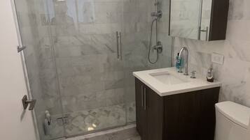 Hair dryer, towels, soap, shampoo