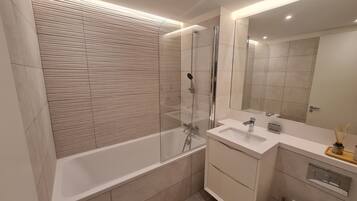 Hair dryer, towels, soap, shampoo