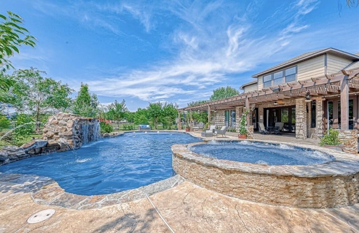 Beautiful oasis in the heart of Katy! Sit poolside or enjoy lakefront access.