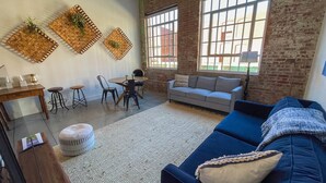 Living area - Mid Century Modern Apartment w/ a pool! (Judson)