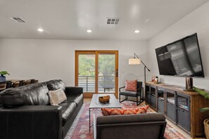 Condo | Living area | 55-inch Smart TV with digital channels, Netflix, Hulu