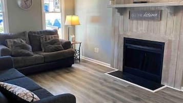 Smart TV, fireplace, books