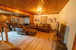 Smart TV, fireplace, books