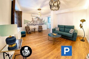 Exclusive Apartment | Living area | Flat-screen TV