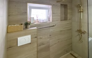 Baignoire, séchoir à cheveux