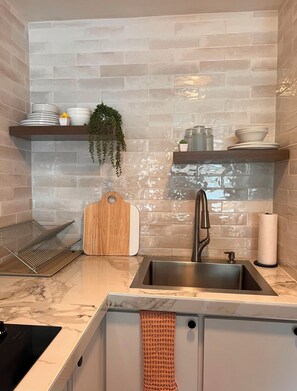Fridge, microwave, stovetop, coffee/tea maker