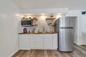 Fridge, microwave, stovetop, coffee/tea maker