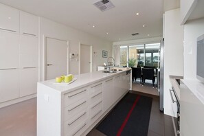 Fridge, microwave, oven, stovetop - Dolphin Cove - Waterfront, Pool, Gym, Free Parking (New Port)