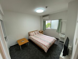 1 bedroom, desk, bed sheets