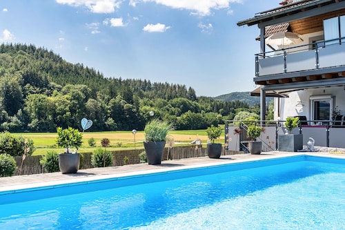 Holiday Apartment "Geisbergblick" with Mountain View, Shared Pool & Wi-Fi