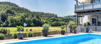 Holiday Apartment "Geisbergblick" with Mountain View, Shared Pool & Wi-Fi