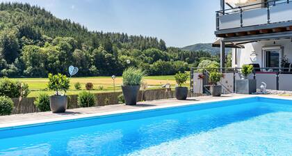 Holiday Apartment "Geisbergblick" with Mountain View, Shared Pool & Wi-Fi