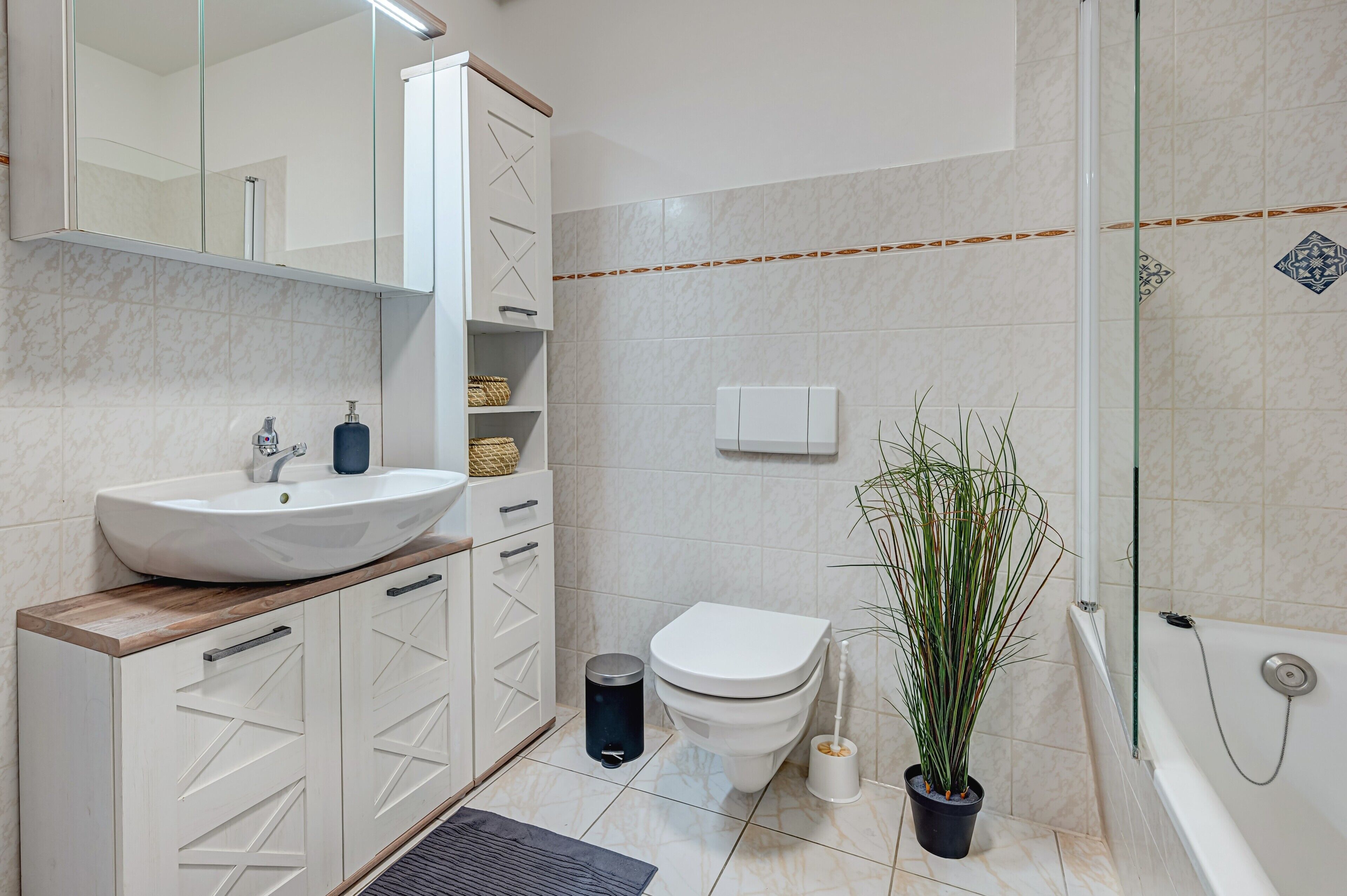 Bathtub, hair dryer, towels