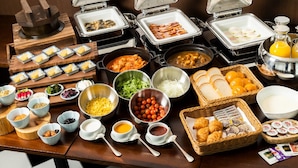 A buffet with various food items, including meats, cheeses, and fruits. - HOTEL ARU KYOTO (Kyoto)