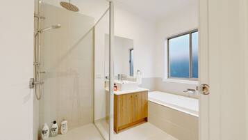 Shower, eco-friendly toiletries, hair dryer, towels