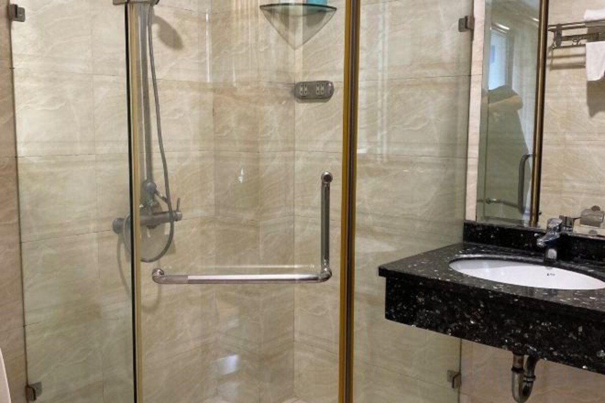Bathroom | Shower, rainfall showerhead, designer toiletries, hair dryer