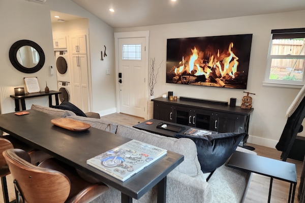 75" Samsung tv + sound system. It comes with apps and free programming