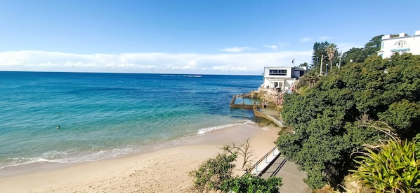 Enjoy breathtaking ocean views from this beachfront hotel, where a paved walkway leads to the shore.