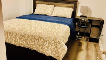 Desk, laptop workspace, free WiFi, bed sheets