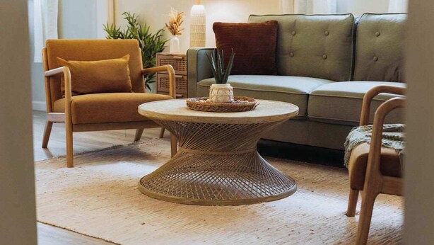 A cozy living room with a round coffee table, a sofa, and a chair. - Lamont 1 2bed Pet-Friendly Apt (Johnson City)