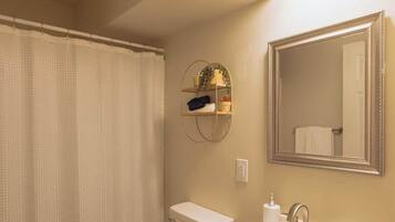Bathtub, hair dryer, towels