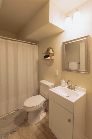 Bathtub, hair dryer, towels