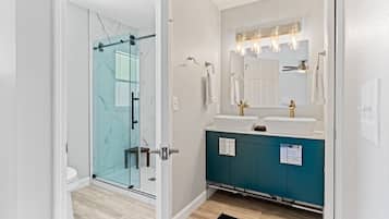 Bathtub, hair dryer, towels
