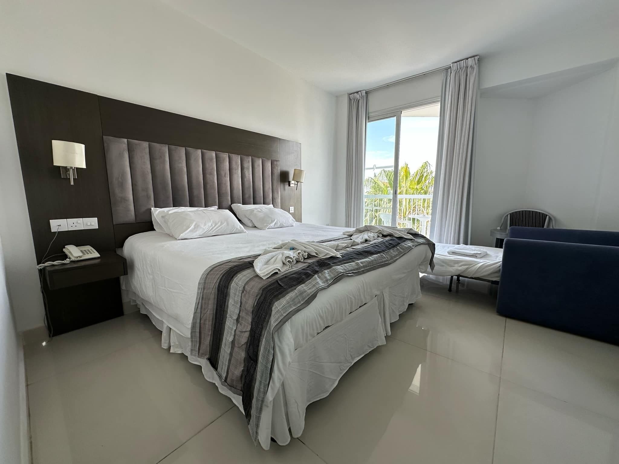 Standard Triple Room, City View | Hypo-allergenic bedding, in-room safe, soundproofing, free WiFi