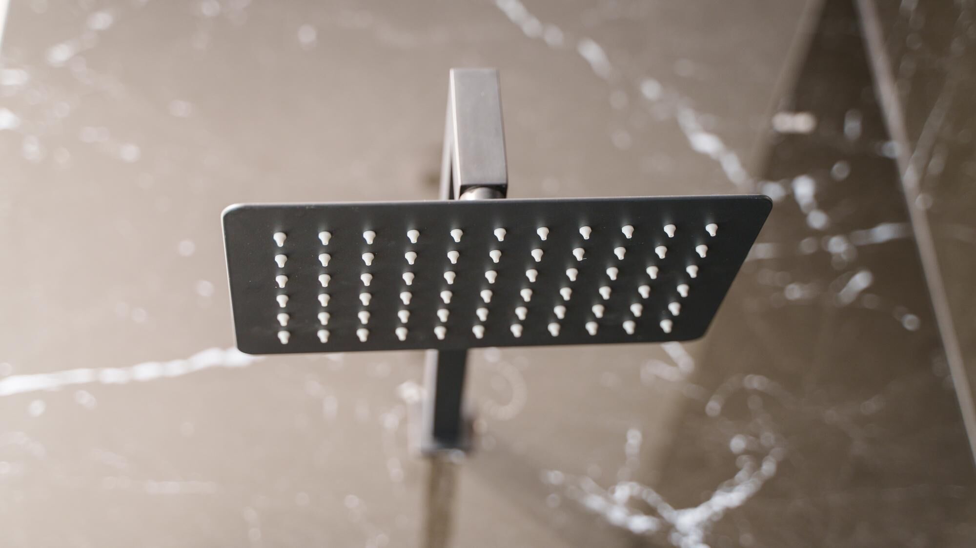 A showerhead with multiple nozzles.