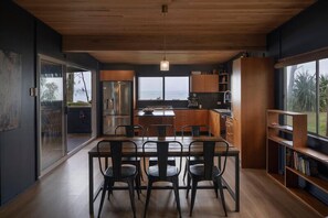 Dining - Norm’s Place - a secluded, unique, absolute water front property at Amity Point (Amity Point)