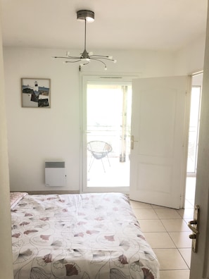 2 dormitorios, tabla de planchar con plancha, wifi y ropa de cama
