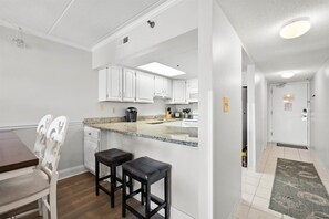 Enjoy cooking in this well-equipped kitchen with an oven and coffee maker.